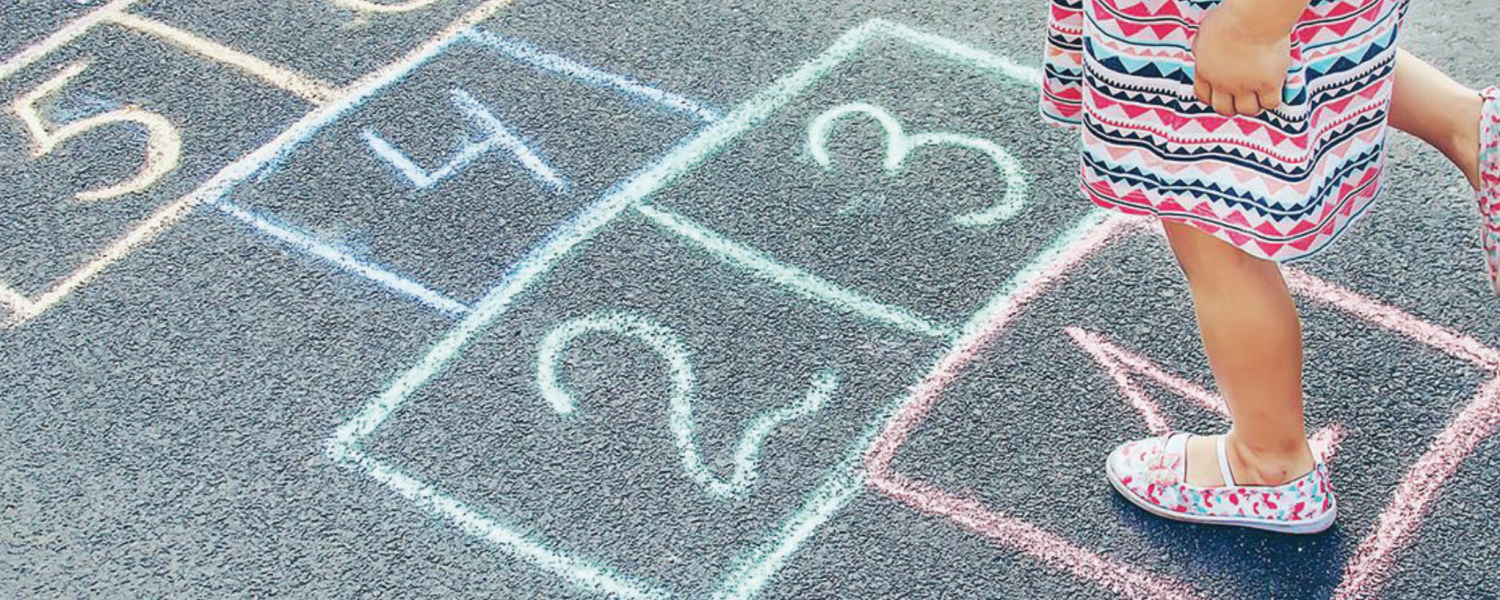 Child playing hopscotch