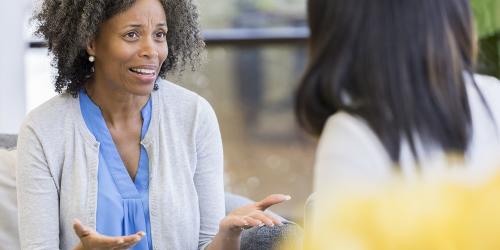 Parent with hands out, palms up looking exasperated