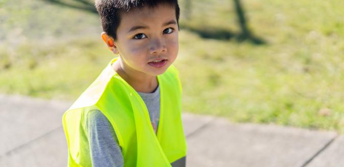 iStock - Boy in reflective jacket