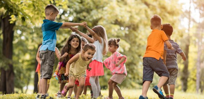 School age children playimg a game outside