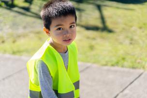 iStock - Boy in reflective jacket